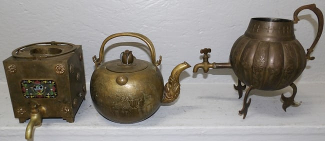 Three Oriental Brass Tea Pots, One with Enamel Decoration