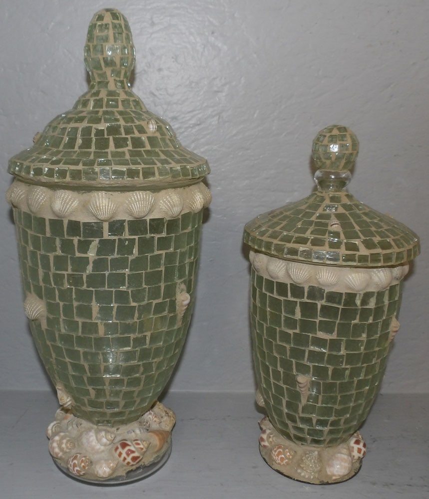 Two Glass & Sea Shell Decorated Covered Urns: Two Glass & Sea Shell Decorated Covered Urns . 18" H 7 1/2" Dia. "ALL DESCRIPTIONS AND ANY CONDITION STATEMENT GIVEN BY LANGSTON AUCTION GALLERY ARE STRICTLY OPINIONS AND LANGSTON'S SHALL HAVE NO RESP