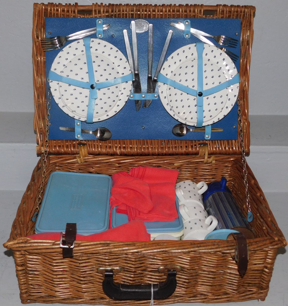 English Picnic Set in Wicker & Leather Strap Case: English Picnic Set in Wicker & Leather Strap Case . Case: 7 1/4" H 21 3/4" W 15" D "ALL DESCRIPTIONS AND ANY CONDITION STATEMENT GIVEN BY LANGSTON AUCTION GALLERY ARE STRICTLY OPINIONS AND LANGSTON'S