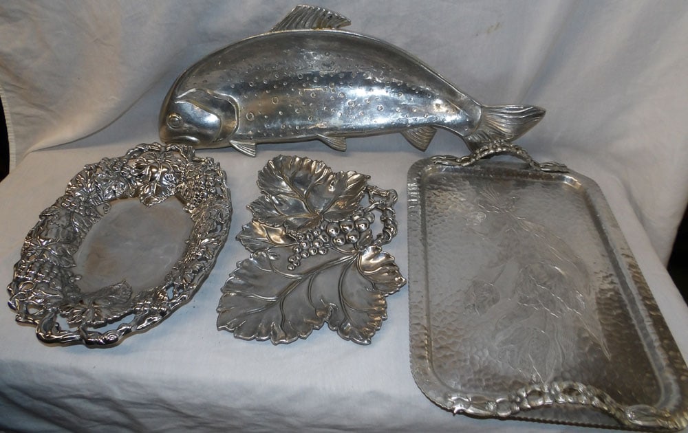 Four Aluminum Trays: Four Aluminum Trays. Up to 24" L 9 1/2" W "ALL DESCRIPTIONS AND ANY CONDITION STATEMENT GIVEN BY LANGSTON AUCTION GALLERY ARE STRICTLY OPINIONS AND LANGSTON'S SHALL HAVE NO RESPONSIBILITY FOR ERRORS O