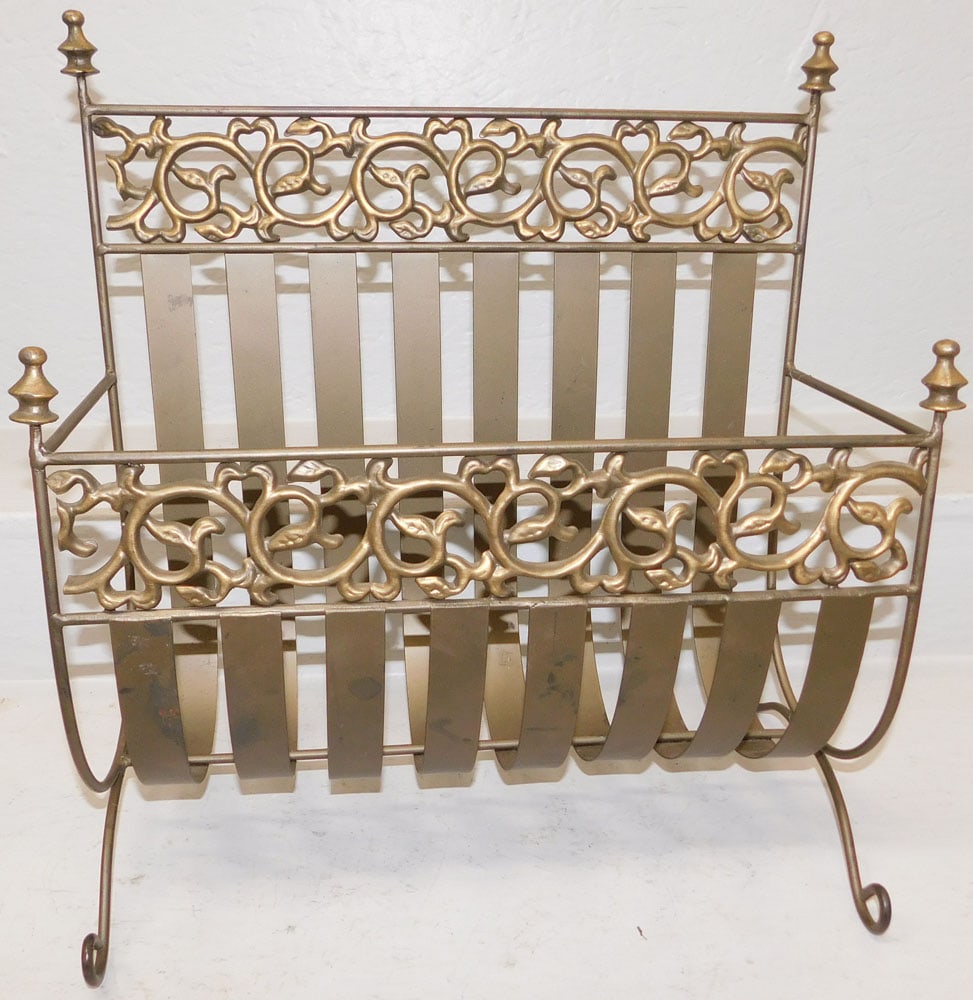 Painted Metal Magazine Stand: Painted Metal Magazine Stand . 19" H 19" W 8" D "ALL DESCRIPTIONS AND ANY CONDITION STATEMENT GIVEN BY LANGSTON AUCTION GALLERY ARE STRICTLY OPINIONS AND LANGSTON'S SHALL HAVE NO RESPONSIBILITY FOR ER