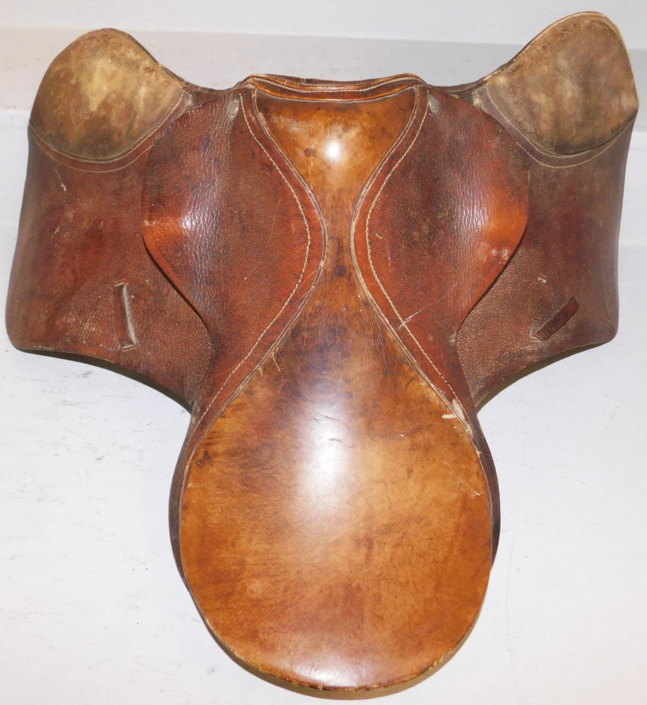 Leather Horse Saddle: Leather Horse Saddle . 27" W 20" D "ALL DESCRIPTIONS AND ANY CONDITION STATEMENT GIVEN BY LANGSTON AUCTION GALLERY ARE STRICTLY OPINIONS AND LANGSTON'S SHALL HAVE NO RESPONSIBILITY FOR ERRORS OR OMISS