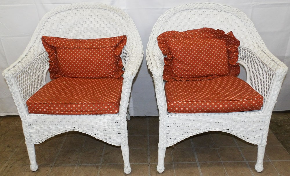 Pair of Painted Wicker Arm Chairs: Pair of Painted Wicker Arm Chairs . 34 1/2" H 29 1/2" W 25" D "ALL DESCRIPTIONS AND ANY CONDITION STATEMENT GIVEN BY LANGSTON AUCTION GALLERY ARE STRICTLY OPINIONS AND LANGSTON'S SHALL HAVE NO RESPONS