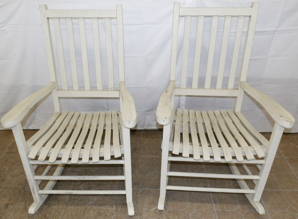 Two Painted Wood Outdoor Rockers: Two Painted Wood Outdoor Rockers. 41" H 25 1/2" W 31" D "ALL DESCRIPTIONS AND ANY CONDITION STATEMENT GIVEN BY LANGSTON AUCTION GALLERY ARE STRICTLY OPINIONS AND LANGSTON'S SHALL HAVE NO RESPONSIBILIT