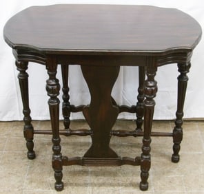 Antique Mahogany Shaped Top Six Leg Stretcher Base Center Table