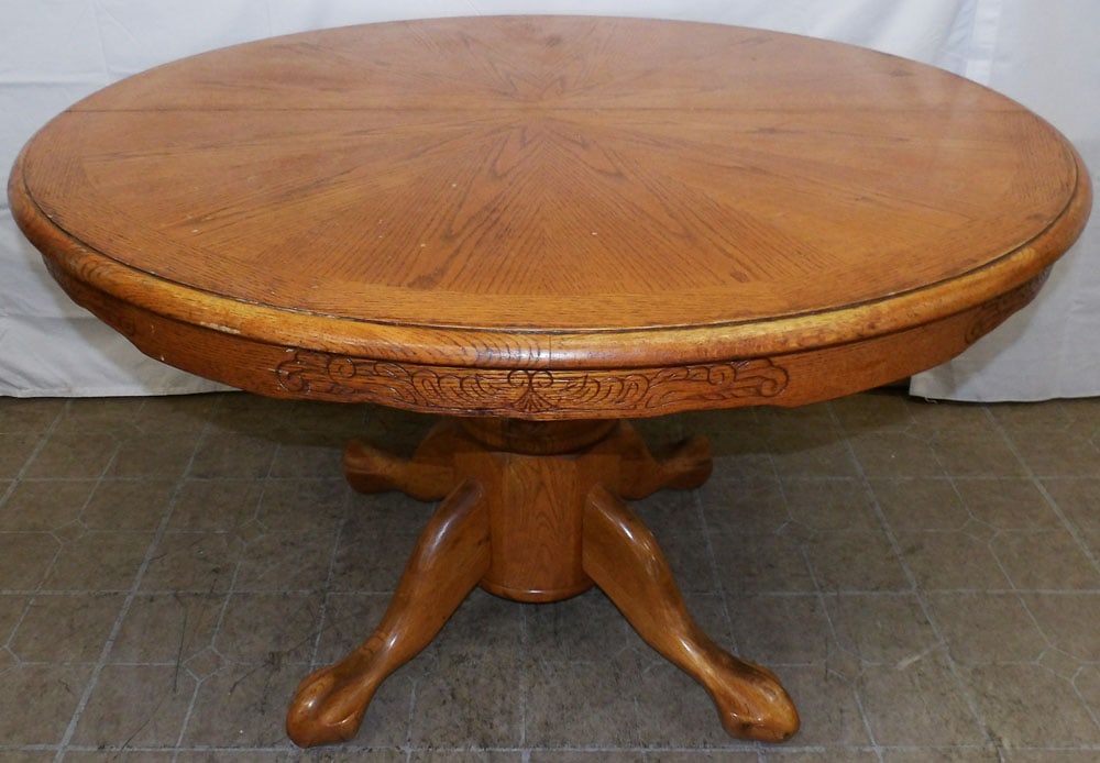 Oak Round Dining Table: Oak Round Dining Table . 29 3/4" H 47 1/2" Dia "ALL DESCRIPTIONS AND ANY CONDITION STATEMENT GIVEN BY LANGSTON AUCTION GALLERY ARE STRICTLY OPINIONS AND LANGSTON'S SHALL HAVE NO RESPONSIBILITY FOR ERR