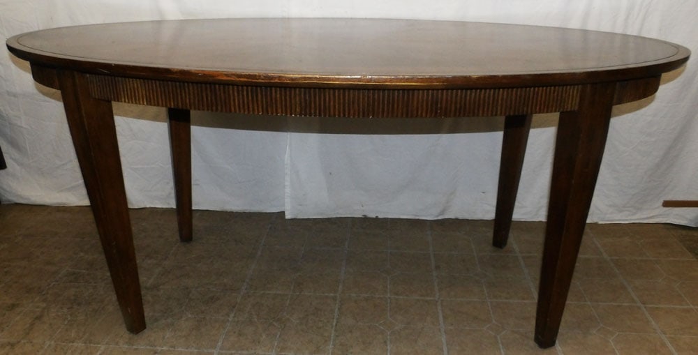 Oval Walnut Dining Table: Oval Walnut Dining Table . 30 1/4" H 70" W 40" D "ALL DESCRIPTIONS AND ANY CONDITION STATEMENT GIVEN BY LANGSTON AUCTION GALLERY ARE STRICTLY OPINIONS AND LANGSTON'S SHALL HAVE NO RESPONSIBILITY FOR E