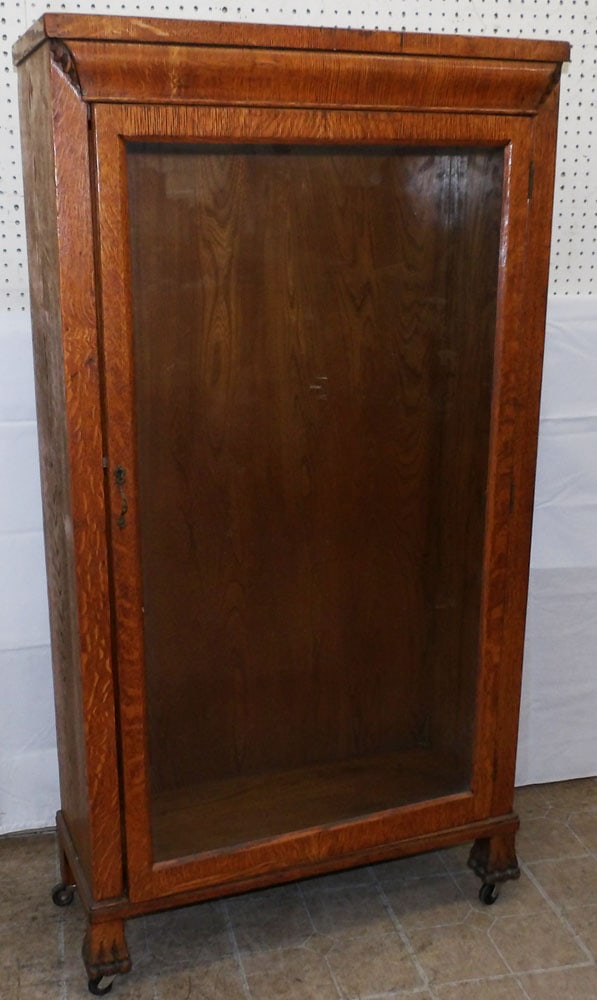 Antique Oak Glass Door Cabinet: Antique Oak Glass Door Cabinet . 59 1/2" H 31 1/4" W 12 1/2" D "ALL DESCRIPTIONS AND ANY CONDITION STATEMENT GIVEN BY LANGSTON AUCTION GALLERY ARE STRICTLY OPINIONS AND LANGSTON'S SHALL HAVE NO RESPON