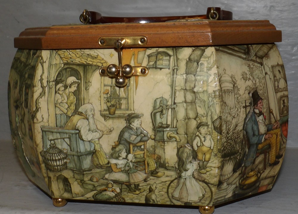 Decoupage Decorated Sewing Box with Bakelite Handle: Decoupage Decorated Sewing Box with Bakelite Handle. 6 1/4" H 10" W 8" D "ALL DESCRIPTIONS AND ANY CONDITION STATEMENT GIVEN BY LANGSTON AUCTION GALLERY ARE STRICTLY OPINIONS AND LANGSTON'S SHALL HAVE