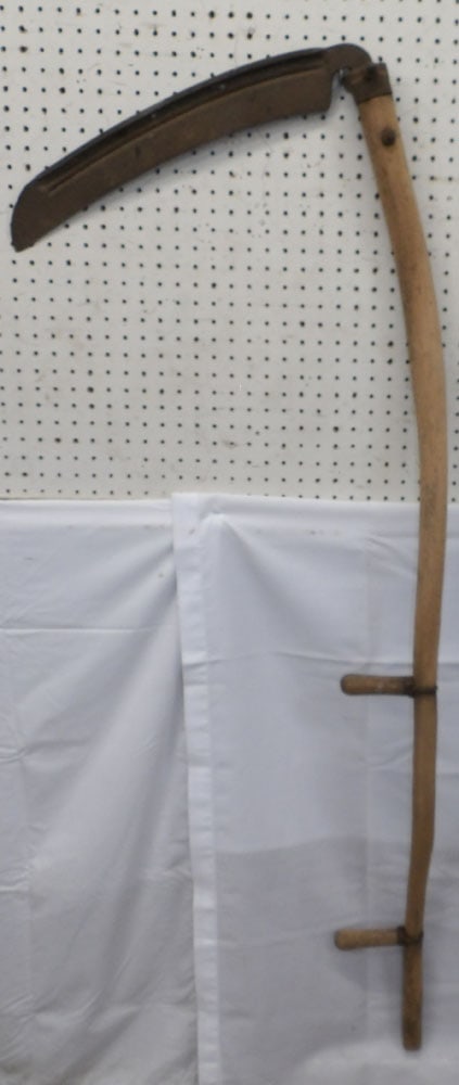 Antique Iron & Wood Handle Scythe: Antique Iron & Wood Handle Scythe . 63 1/2" Long 23" W "ALL DESCRIPTIONS AND ANY CONDITION STATEMENT GIVEN BY LANGSTON AUCTION GALLERY ARE STRICTLY OPINIONS AND LANGSTON'S SHALL HAVE NO RESPONSIBILITY