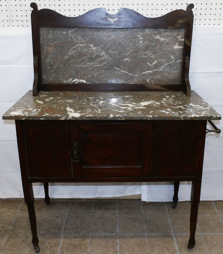 Mahogany & Marble Top Wash Stand: Mahogany & Marble Top Wash Stand. 47" H 36" W 17 1/4" D "ALL DESCRIPTIONS AND ANY CONDITION STATEMENT GIVEN BY LANGSTON AUCTION GALLERY ARE STRICTLY OPINIONS AND LANGSTON'S SHALL HAVE NO RESPONSIBILIT