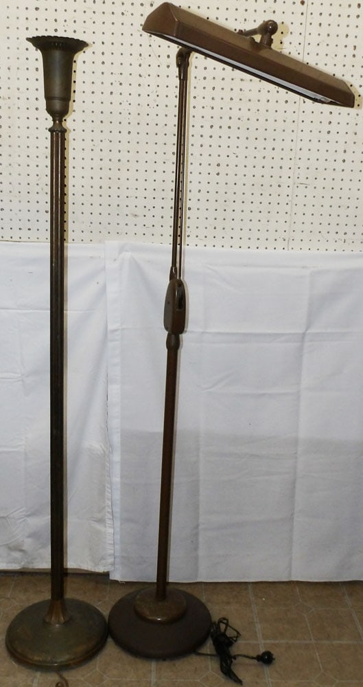 Two Metal Floor Lamps: Two Metal Floor Lamps. 63" H 19" W "ALL DESCRIPTIONS AND ANY CONDITION STATEMENT GIVEN BY LANGSTON AUCTION GALLERY ARE STRICTLY OPINIONS AND LANGSTON'S SHALL HAVE NO RESPONSIBILITY FOR ERRORS OR OMISS