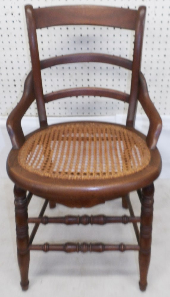 Walnut & Cane Seat Side Chair: Walnut & Cane Seat Side Chair . 32" H 18 1/4" W 18" D "ALL DESCRIPTIONS AND ANY CONDITION STATEMENT GIVEN BY LANGSTON AUCTION GALLERY ARE STRICTLY OPINIONS AND LANGSTON'S SHALL HAVE NO RESPONSIBILITY