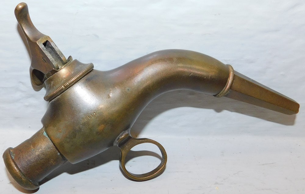 Bronze Keg Spout: Bronze Keg Spout . 5 3/4" Long "ALL DESCRIPTIONS AND ANY CONDITION STATEMENT GIVEN BY LANGSTON AUCTION GALLERY ARE STRICTLY OPINIONS AND LANGSTON'S SHALL HAVE NO RESPONSIBILITY FOR ERRORS OR OMISSIONS