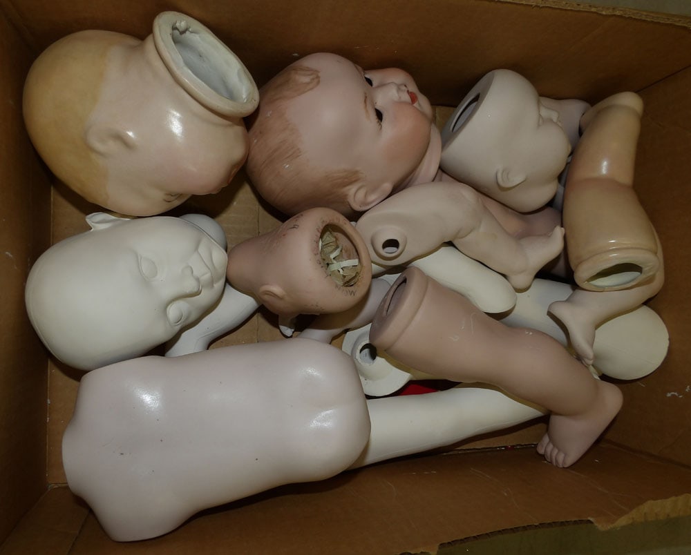 Lot Porcelain Doll Parts: Lot Porcelain Doll Parts. Up to 10" H 1 1/2" W 3" D "ALL DESCRIPTIONS AND ANY CONDITION STATEMENT GIVEN BY LANGSTON AUCTION GALLERY ARE STRICTLY OPINIONS AND LANGSTON'S SHALL HAVE NO RESPONSIBILITY