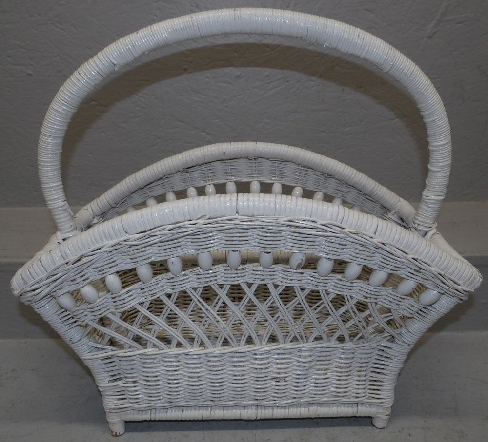 Painted Wicker Magazine Stand: Painted Wicker Magazine Stand. 19 1/2" H 19 1/2" W 9 1/2" D "ALL DESCRIPTIONS AND ANY CONDITION STATEMENT GIVEN BY LANGSTON AUCTION GALLERY ARE STRICTLY OPINIONS AND LANGSTON'S SHALL HAVE NO