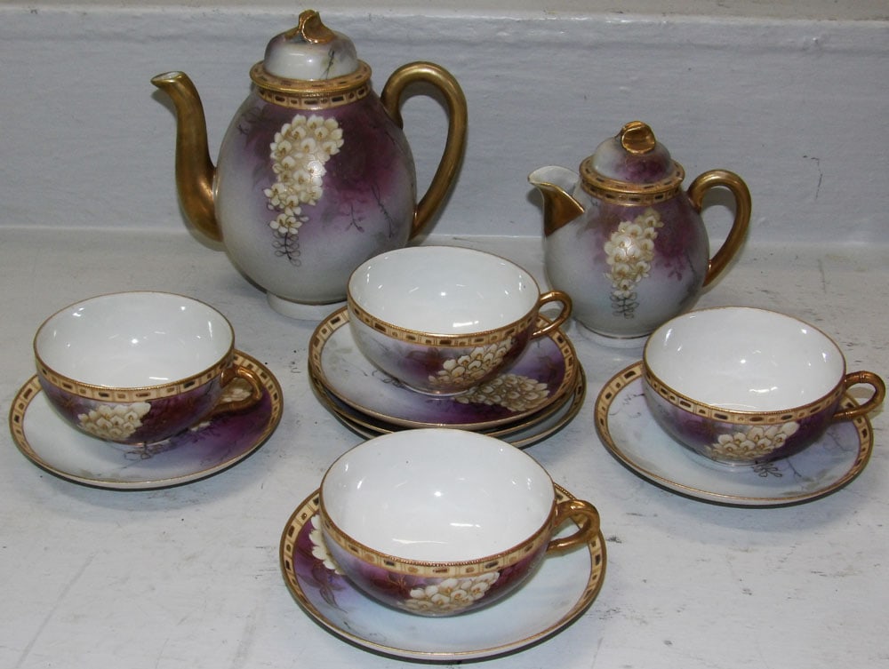 Antique Twelve Piece Hand Painted Nippon Wisteria Flower Tea Set: Antique Twelve Piece Hand Painted Nippon Wisteria Flower Tea Set . Up to 7" H 7" W "ALL DESCRIPTIONS AND ANY CONDITION STATEMENT GIVEN BY LANGSTON AUCTION GALLERY ARE STRICTLY OPINIONS AND
