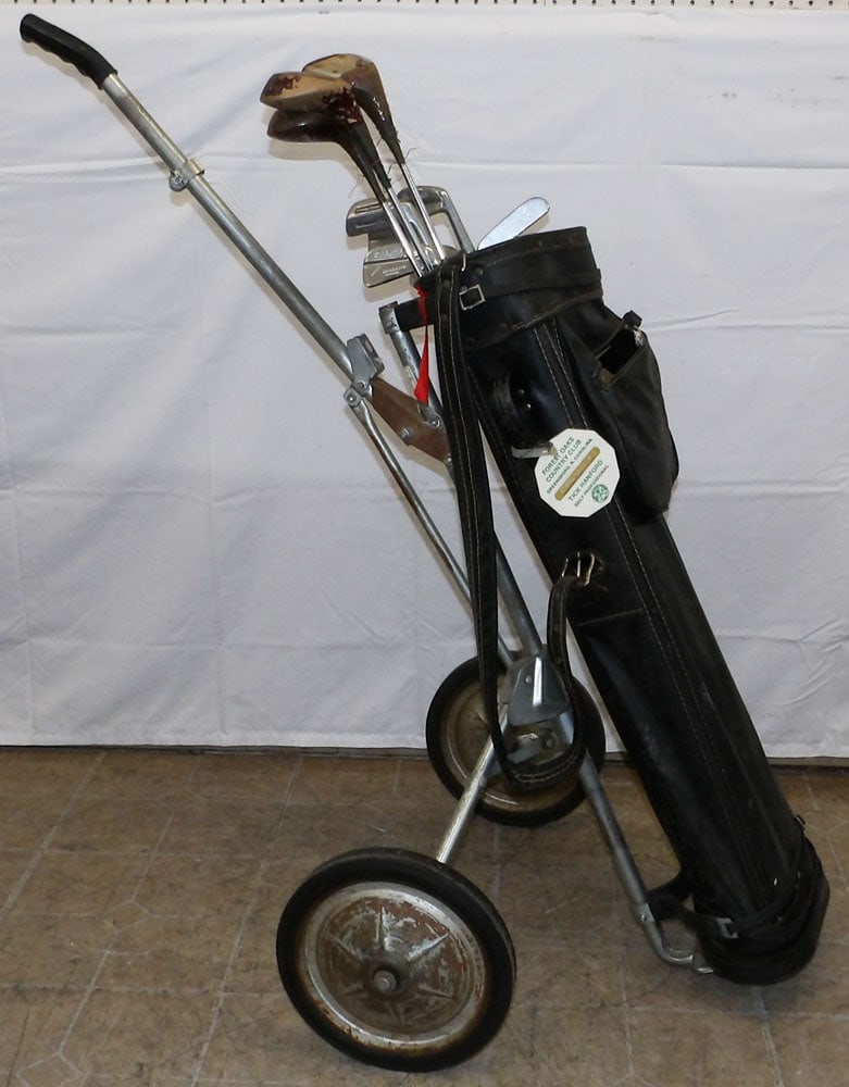 Golf Bag With Antique Multi Brand Ladies Golf Clubs: Golf Bag With Antique Multi Brand Ladies Golf Clubs. 44" H 10" Dia "ALL DESCRIPTIONS AND ANY CONDITION STATEMENT GIVEN BY LANGSTON AUCTION GALLERY ARE STRICTLY OPINIONS AND LANGSTON'S SHALL HAVE NO