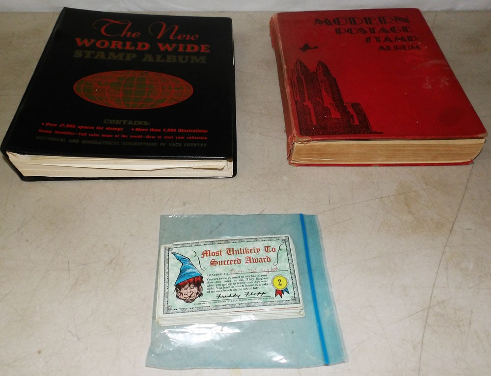 Two Stamp Albums: Two Stamp Albums. Album: 10" x 11 1/2" "ALL DESCRIPTIONS AND ANY CONDITION STATEMENT GIVEN BY LANGSTON AUCTION GALLERY ARE STRICTLY OPINIONS AND LANGSTON'S SHALL HAVE NO RESPONSIBILITY FOR ERRORS OR