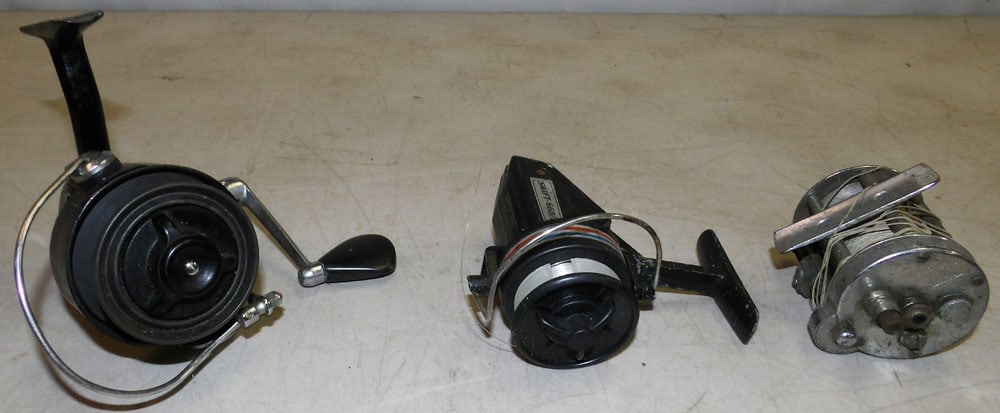 Three Vintage Fishing Reels: Three Vintage Fishing Reels. Up to 5" H 5" W "ALL DESCRIPTIONS AND ANY CONDITION STATEMENT GIVEN BY LANGSTON AUCTION GALLERY ARE STRICTLY OPINIONS AND LANGSTON'S SHALL HAVE NO RESPONSIBILITY FOR