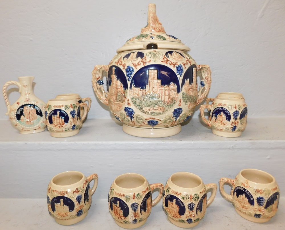 Ten Piece German Pottery Cider Set: Ten Piece German Pottery Cider Set. Up to 12 1/2" H 12 1/2" W ALL DESCRIPTIONS AND ANY CONDITION STATEMENT GIVEN BY LANGSTON AUCTION GALLERY ARE STRICTLY OPINIONS AND LANGSTON'S SHALL HAVE NO RESPONSI