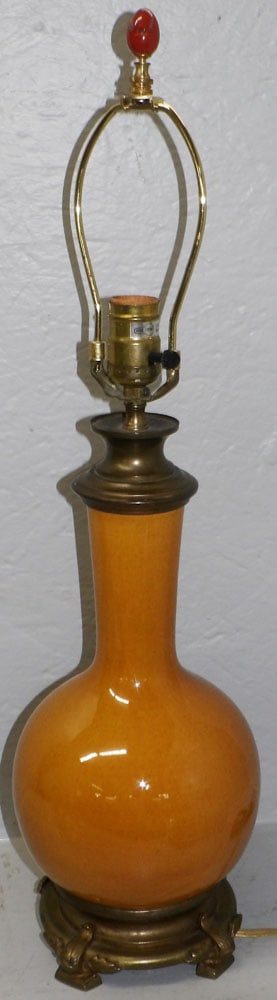 Chinese Export Style Mustard Yellow Bulbous Vase Made Into Lamp on Brass Base: Chinese Export Style Mustard Yellow Bulbous Vase Made Into Lamp on Brass Base. 25 1/4" H 6 1/2" Dia. ALL DESCRIPTIONS AND ANY CONDITION STATEMENT GIVEN BY LANGSTON AUCTION GALLERY ARE STRICTLY