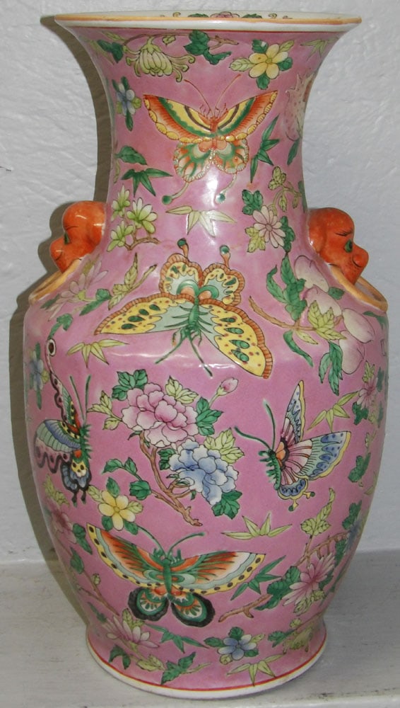 Large Chinese Pink Famile Rose Butterfly Motif Vase with Foo Dog Handles: Large Chinese Pink Famile Rose Butterfly Motif Vase with Foo Dog Handles. 18" H 10" Dia. ALL DESCRIPTIONS AND ANY CONDITION STATEMENT GIVEN BY LANGSTON AUCTION GALLERY ARE STRICTLY OPINIONS AND LANGST
