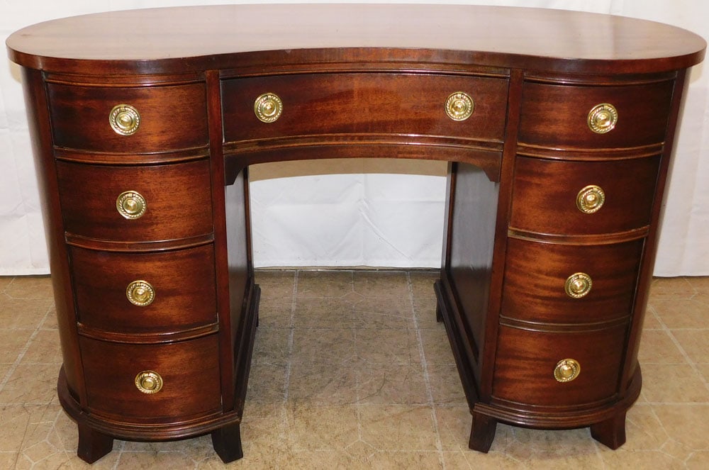 Mahogany Kidney Shaped Top Desk by Jamestown Table Company: Mahogany Kidney Shaped Top Desk by Jamestown Table Company . 30" H 46 1/2" W 23" D ALL DESCRIPTIONS AND ANY CONDITION STATEMENT GIVEN BY LANGSTON AUCTION GALLERY ARE STRICTLY OPINIONS AND LANGSTON'S S