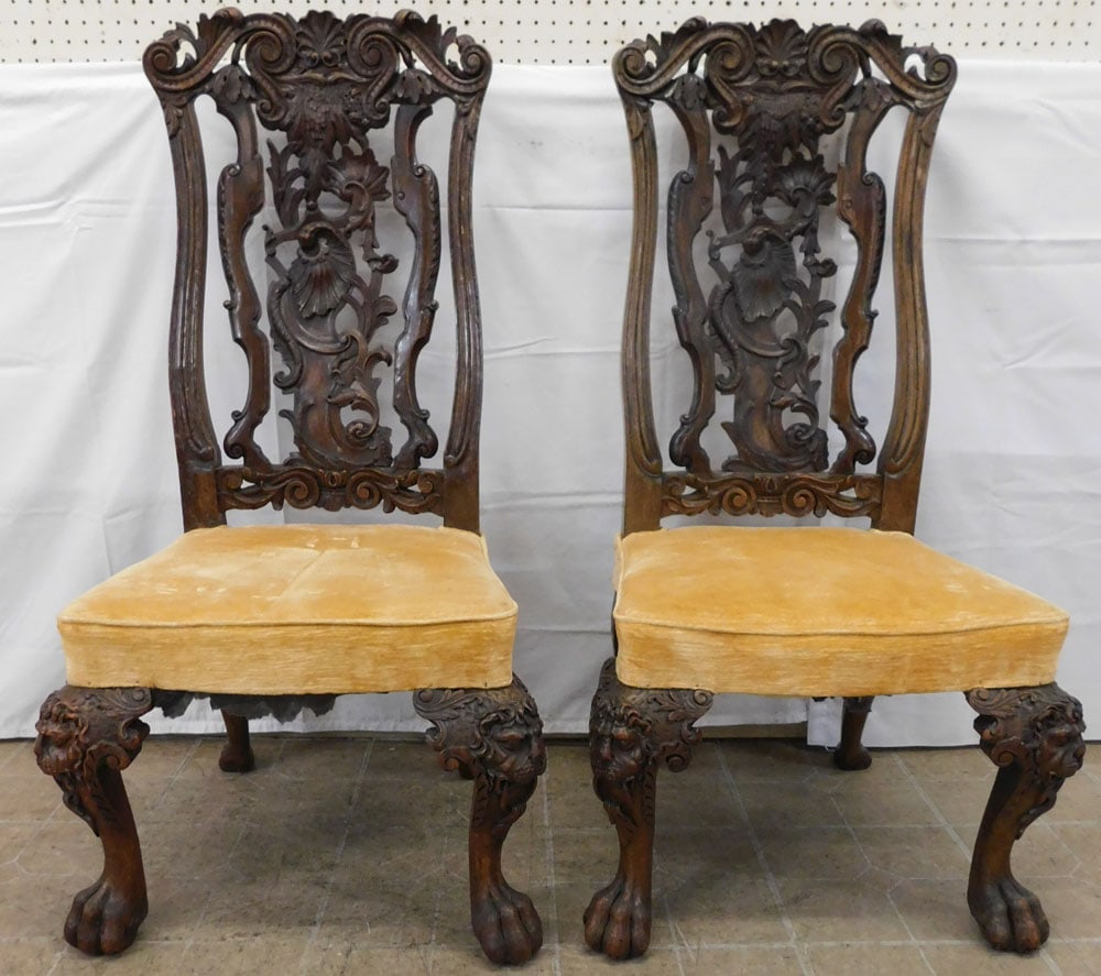 Pair of 19th Century Carved Walnut Side Chairs with Lion Head Accents: Pair of 19th Century Carved Walnut Side Chairs with Lion Head Accents . 45" H 23 1/2" W 23 1/2" D ALL DESCRIPTIONS AND ANY CONDITION STATEMENT GIVEN BY LANGSTON AUCTION GALLERY ARE STRICTLY OPINIONS A