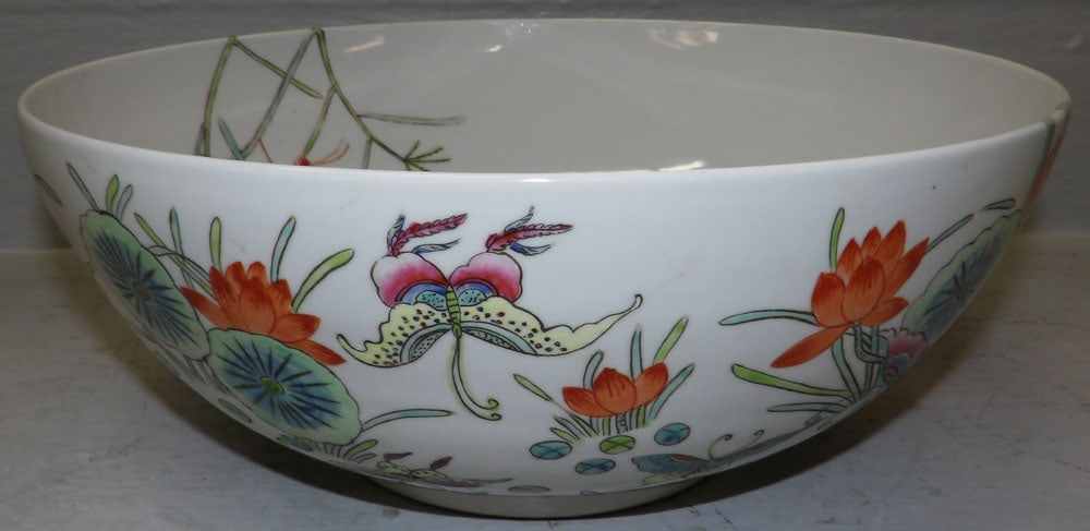 Oriental Porcelain Bowl with Butterfly Motif: Oriental Porcelain Bowl with Butterfly Motif. 5 1/4" H 13" Dia. ALL DESCRIPTIONS AND ANY CONDITION STATEMENT GIVEN BY LANGSTON AUCTION GALLERY ARE STRICTLY OPINIONS AND LANGSTON'S SHALL HAVE NO
