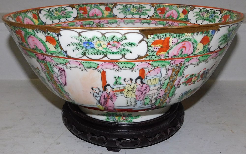 Large Rose Medallion Style Punch Bowl on Teak Wood Stand: Large Rose Medallion Style Punch Bowl on Teak Wood Stand . 8" H 14 1/4" Dia. ALL DESCRIPTIONS AND ANY CONDITION STATEMENT GIVEN BY LANGSTON AUCTION GALLERY ARE STRICTLY OPINIONS AND LANGSTON'S