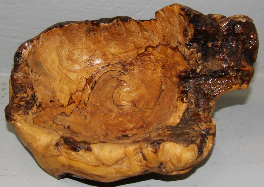 Maple Burled Wood Bowl: Maple Burled Wood Bowl . 6" H 11" W 7" D ALL DESCRIPTIONS AND ANY CONDITION STATEMENT GIVEN BY LANGSTON AUCTION GALLERY ARE STRICTLY OPINIONS AND LANGSTON'S SHALL HAVE NO RESPONSIBILITY FOR ERRORS