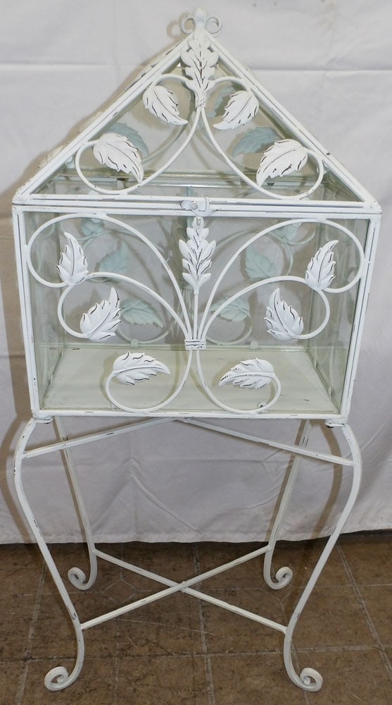 Painted Metal & Glass Showcase Top Stand: Painted Metal & Glass Showcase Top Stand. 37 1/4" H 18" W 10 1/2" D ALL DESCRIPTIONS AND ANY CONDITION STATEMENT GIVEN BY LANGSTON AUCTION GALLERY ARE STRICTLY OPINIONS AND LANGSTON'S SHALL HAVE NO