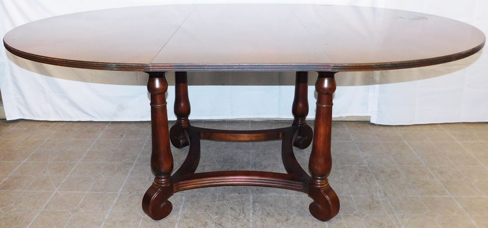 Cherry Oval Dining Table with One Leaf by Ethan Allen: Cherry Oval Dining Table with One Leaf by Ethan Allen . 30" H 76 1/2" W 56 1/2" D ALL DESCRIPTIONS AND ANY CONDITION STATEMENT GIVEN BY LANGSTON AUCTION GALLERY ARE STRICTLY OPINIONS AND LANGSTON'S SH