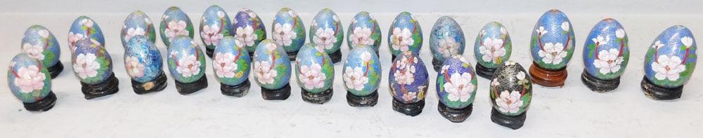 Twenty Six Oriental Cloisonne Eggs: Twenty Six Oriental Cloisonne Eggs . Up to 2 3/4" H 2" Dia. ALL DESCRIPTIONS AND ANY CONDITION STATEMENT GIVEN BY LANGSTON AUCTION GALLERY ARE STRICTLY OPINIONS AND LANGSTON'S SHALL HAVE NO RESPONSIBI