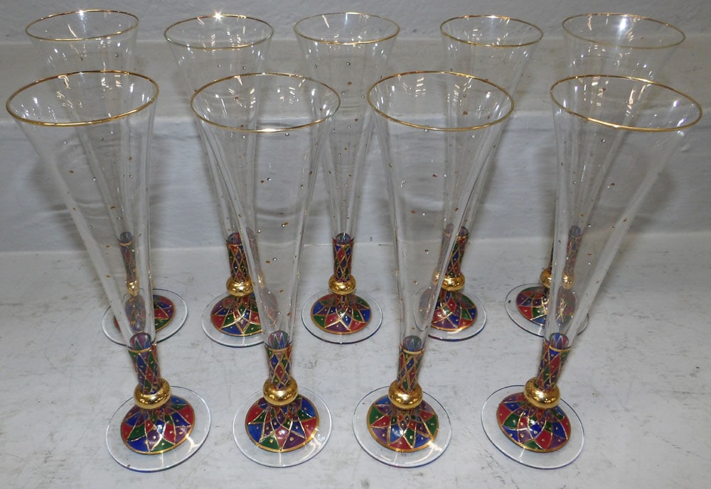 Nine Enamel Decorated Champagne Flutes: Nine Enamel Decorated Champagne Flutes . 10 1/2" H ALL DESCRIPTIONS AND ANY CONDITION STATEMENT GIVEN BY LANGSTON AUCTION GALLERY ARE STRICTLY OPINIONS AND LANGSTON'S SHALL HAVE NO RESPONSIBILITY