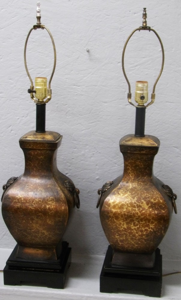 Pair of Oriental Bronze Finish Double Handle Urn Form Lamps on Teak Wood Bases: Pair of Oriental Bronze Finish Double Handle Urn Form Lamps on Teak Wood Bases. 29" H 8" W 7 1/4" D ALL DESCRIPTIONS AND ANY CONDITION STATEMENT GIVEN BY LANGSTON AUCTION GALLERY ARE STRICTLY OPINIONS