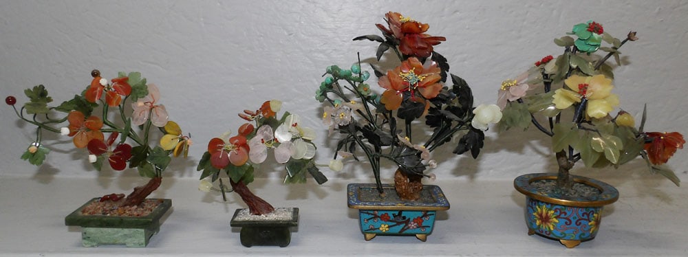 Four Jade Stone Plants with Soapstone Planters & Cloisonne Planters: Four Jade Stone Plants with Soapstone Planters & Cloisonne Planters . Up to 8" H 6" W ALL DESCRIPTIONS AND ANY CONDITION STATEMENT GIVEN BY LANGSTON AUCTION GALLERY ARE STRICTLY OPINIONS AND