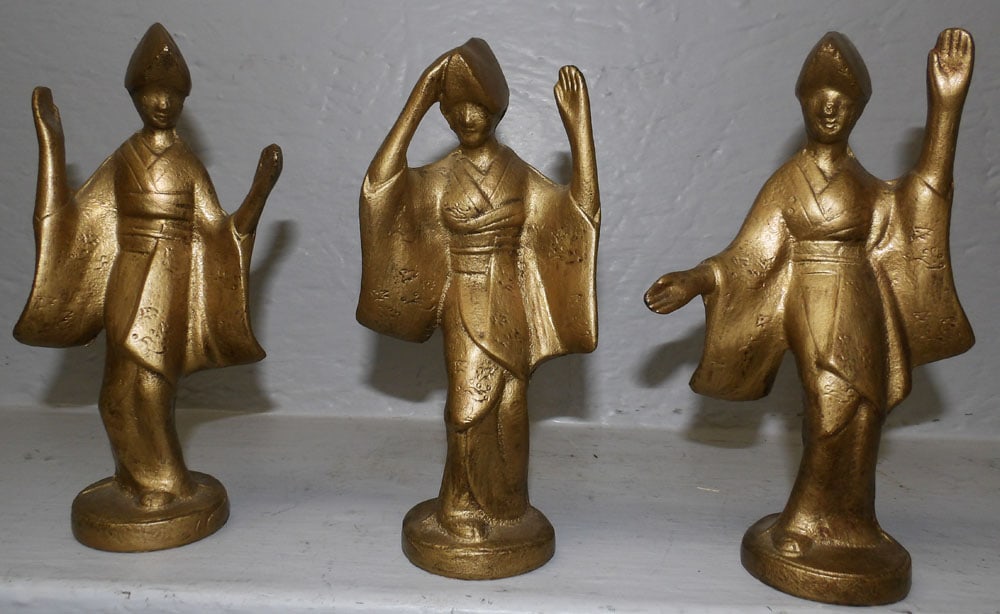 Three Gilded Cast Iron Oriental Figurines: Three Gilded Cast Iron Oriental Figurines. Up to 7 3/4" H 4 3/4" W ALL DESCRIPTIONS AND ANY CONDITION STATEMENT GIVEN BY LANGSTON AUCTION GALLERY ARE STRICTLY OPINIONS AND LANGSTON'S SHALL HAVE NO