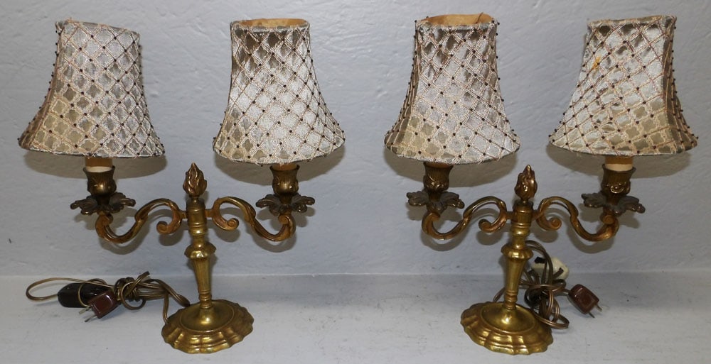 Pair of Cast Brass Candelabra Lamps: Pair of Cast Brass Candelabra Lamps. 14" H 12 3/4" W ALL DESCRIPTIONS AND ANY CONDITION STATEMENT GIVEN BY LANGSTON AUCTION GALLERY ARE STRICTLY OPINIONS AND LANGSTON'S SHALL HAVE NO RESPONSIBILITY