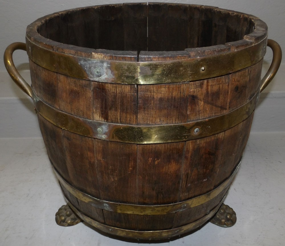 Antique Oak & Brass Bound Barrel Form Wine Cooler with Paw Feet: Antique Oak & Brass Bound Barrel Form Wine Cooler with Paw Feet. 16" H 19" W ALL DESCRIPTIONS AND ANY CONDITION STATEMENT GIVEN BY LANGSTON AUCTION GALLERY ARE STRICTLY OPINIONS AND LANGSTON'S SHALL H