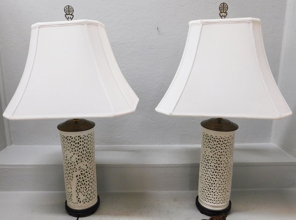 Pair of Oriental Porcelain Blanc De Chine Open Work Lamps: Pair of Oriental Porcelain Blanc De Chine Open Work Lamps . 33" H 18 1/2" W 13 1/4" D ALL DESCRIPTIONS AND ANY CONDITION STATEMENT GIVEN BY LANGSTON AUCTION GALLERY ARE STRICTLY OPINIONS AND