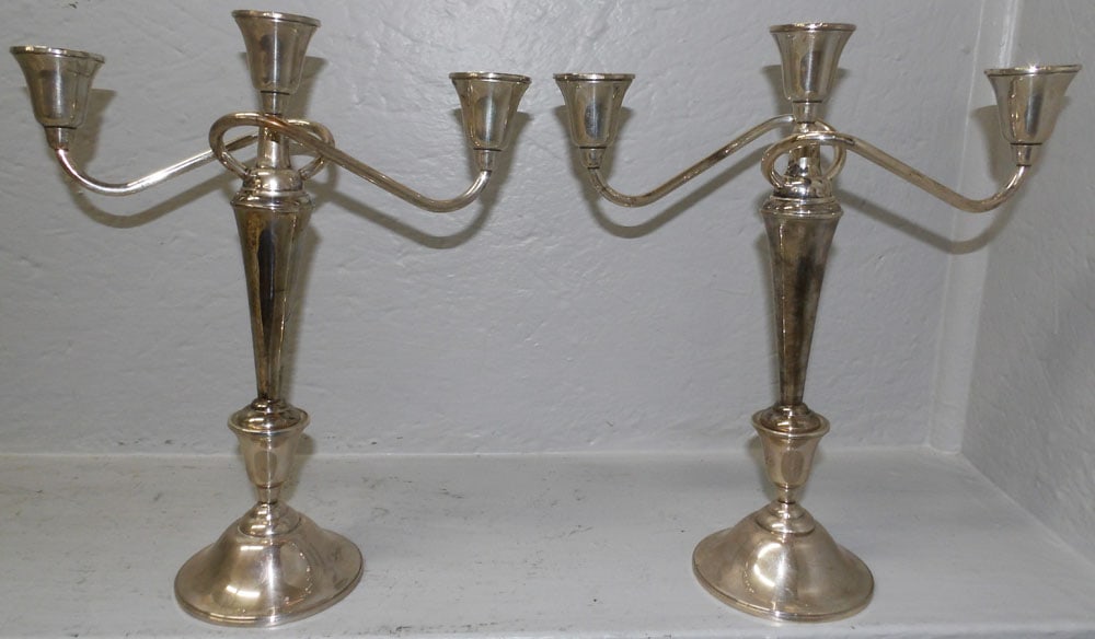Pair of Three Light Sterling Weighted Candelabras by International: Pair of Three Light Sterling Weighted Candelabras by International . 12 1/4" H 10 1/2" W ALL DESCRIPTIONS AND ANY CONDITION STATEMENT GIVEN BY LANGSTON AUCTION GALLERY ARE STRICTLY OPINIONS AND LANGST