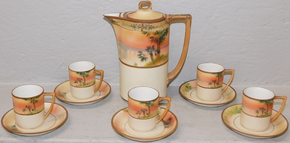 Eleven Piece Hand Painted Nippon Chocolate Set: Eleven Piece Hand Painted Nippon Chocolate Set. 8 3/4" H 7" W ALL DESCRIPTIONS AND ANY CONDITION STATEMENT GIVEN BY LANGSTON AUCTION GALLERY ARE STRICTLY OPINIONS AND LANGSTON'S SHALL HAVE NO