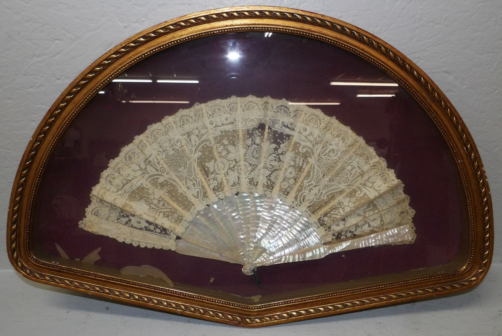 Mother of Pearl Fan in Enclosed Frame: Mother of Pearl Fan in Enclosed Frame . 18" x 27 3/4" ALL DESCRIPTIONS AND ANY CONDITION STATEMENT GIVEN BY LANGSTON AUCTION GALLERY ARE STRICTLY OPINIONS AND LANGSTON'S SHALL HAVE NO