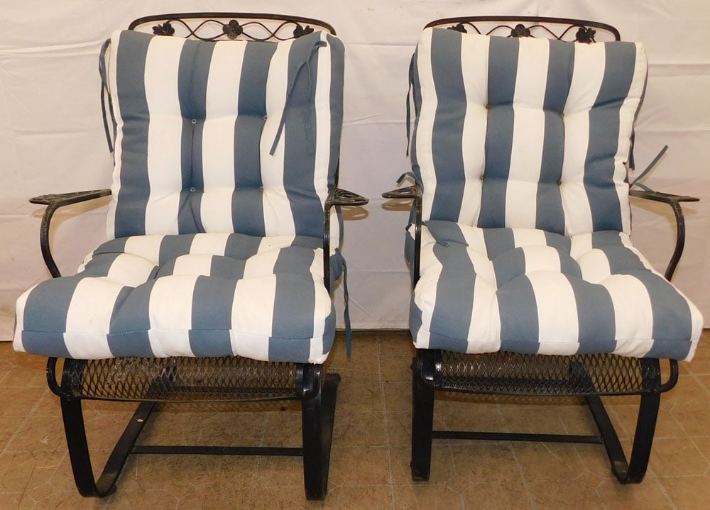 Pair of Wrought Iron Rocking Gliders: Pair of Wrought Iron Rocking Gliders . 38" H 26" W 28" D ALL DESCRIPTIONS AND ANY CONDITION STATEMENT GIVEN BY LANGSTON AUCTION GALLERY ARE STRICTLY OPINIONS AND LANGSTON'S SHALL HAVE NO