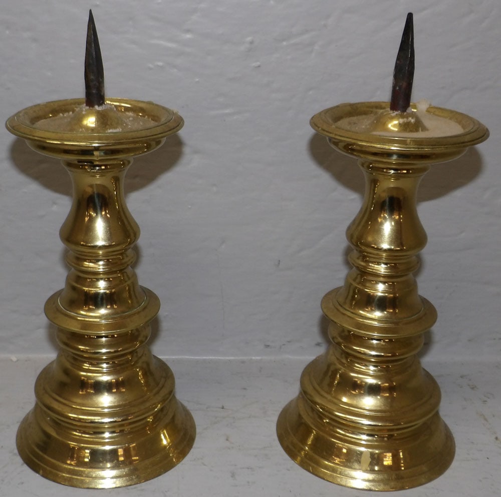 Pair of Brass Pricket Candlesticks by Virginia Metalcrafters: Pair of Brass Pricket Candlesticks by Virginia Metalcrafters . 9 1/2" H 4" Dia. ALL DESCRIPTIONS AND ANY CONDITION STATEMENT GIVEN BY LANGSTON AUCTION GALLERY ARE STRICTLY OPINIONS AND LANGSTON'S