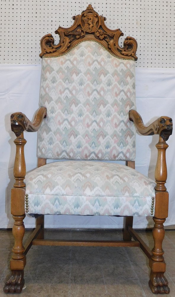 Antique Figural Carved Walnut Arm Chair with Coat of Arms Crest: Antique Figural Carved Walnut Arm Chair with Coat of Arms Crest. 58" H 26" W 26" D ALL DESCRIPTIONS AND ANY CONDITION STATEMENT GIVEN BY LANGSTON AUCTION GALLERY ARE STRICTLY OPINIONS AND LANGSTON'S S