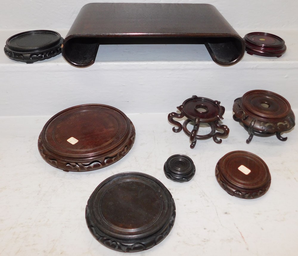 Lot of Oriental Teak Wood Stands: Lot of Oriental Teak Wood Stands . Up to 3" H 16 1/4" W 10" D ALL DESCRIPTIONS AND ANY CONDITION STATEMENT GIVEN BY LANGSTON AUCTION GALLERY ARE STRICTLY OPINIONS AND LANGSTON'S SHALL HAVE NO