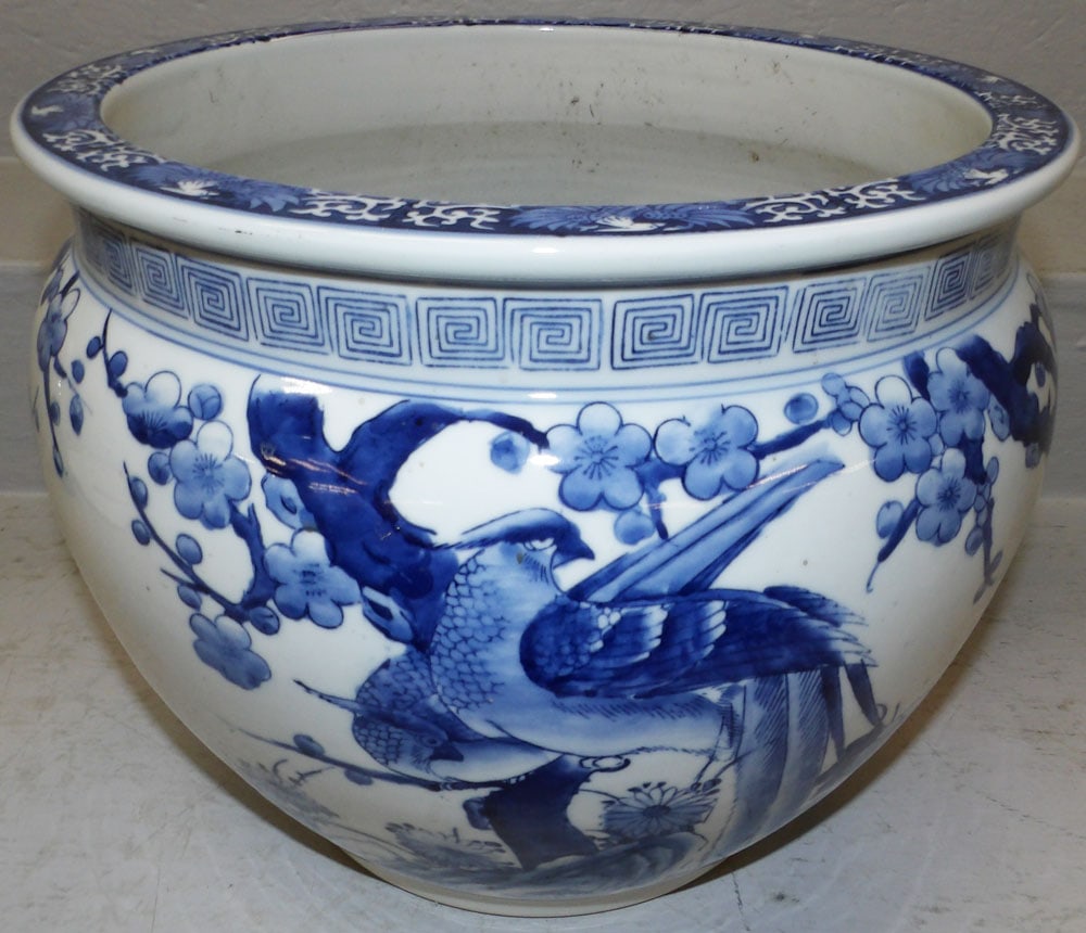 Oriental Porcelain Blue & White Jardiniere with Pheasant Motif: Oriental Porcelain Blue & White Jardiniere with Pheasant Motif. 11 1/2" H 15" Dia. ALL DESCRIPTIONS AND ANY CONDITION STATEMENT GIVEN BY LANGSTON AUCTION GALLERY ARE STRICTLY OPINIONS AND LANGSTON'S S